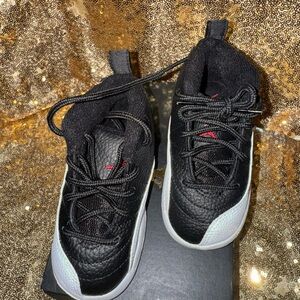 Black and White Sneakers with Red Accents